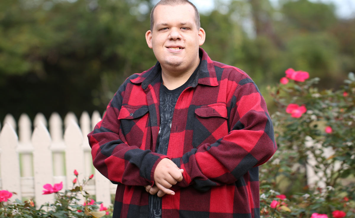 Image of a man standing in a garden